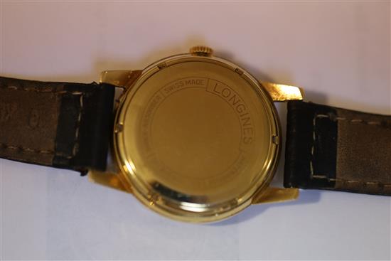 A gentlemans early 1960s 18ct gold Longines automatic wrist watch,